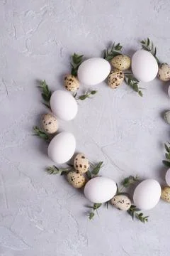 Circle border for easter card or invitation. Easter wreath with eggs Stock Photos