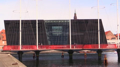 The Circle Bridge, the Black Diamond.  Rowboat overtakes a gondola in background Video stock 89403140