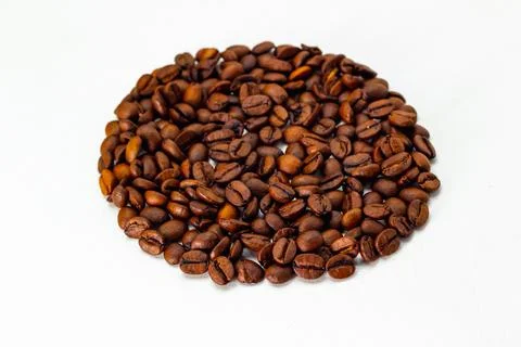 Circle of coffee beans on a white background Stock Photos
