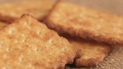 Circle crackers with salt. Close up. Rotating cracker cookies background. Tasty Stock-Footage 171949128
