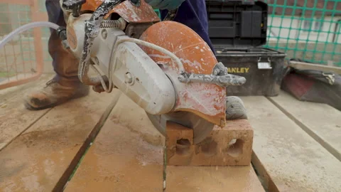 Circle Cut Off Saw Cutting Brick Video stock 239681972