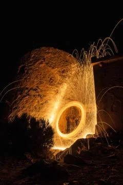 Circle of fire in the middle of the night Stock Photos