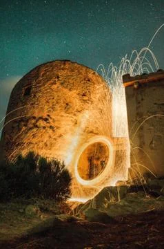 Circle of fire in the middle of the night Stock Photos