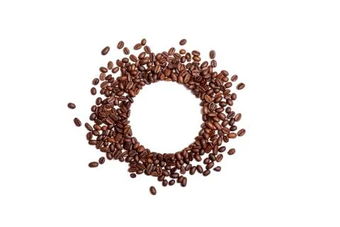 Circle frame of roasted brown coffee beans isolated on white background may u Stock Photos