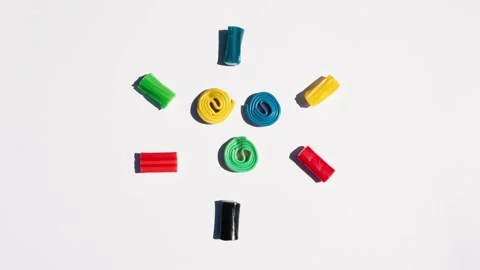 Circle of gummies of different colors moving Stock Footage 134414409