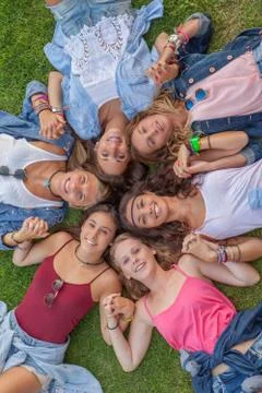 Circle of happy teens Stock Photos