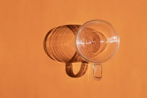 A circle with a hard shadow on a colored background Foto stock