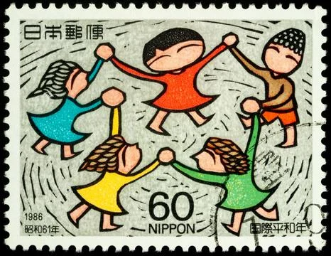Circle of laughing children on postage stamp Stock Photos