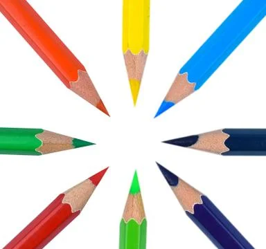 Circle made with eight different colored wood pencil crayon arranged before a Stock Photos