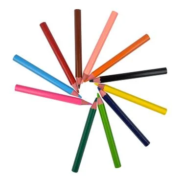 Circle pattern made with many different colored wood pencil crayons on white Foto stock