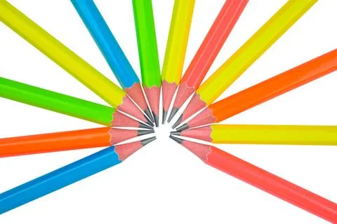 Circle pattern made with some different colored wood pencil crayons on white Foto stock