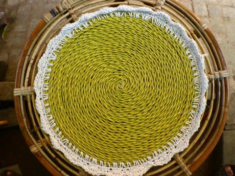 Circle pattern tablecloth made from water hyacinth plant Stock Photos