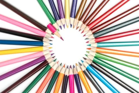 Circle of pencils with a pointer Stock Photos