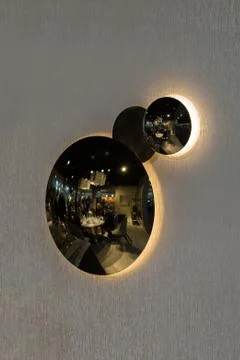 Circle shape three wall chandeliers lamps. A chandelier on the wall with a ro Stock Photos