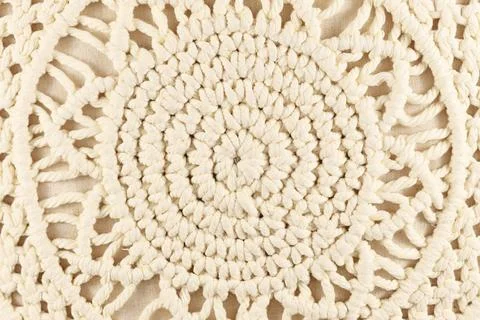 Circle shaped Macrame pattern, a form of textile produced using knotting Stock Photos