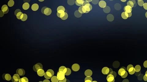 Circle-shaped yellow lights bokeh pattern on black background whith copy spac Foto stock
