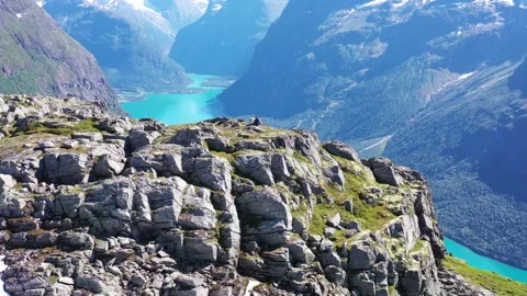 Circle shot of mountain peak in Norway against glacier water view Stock Footage 157596529