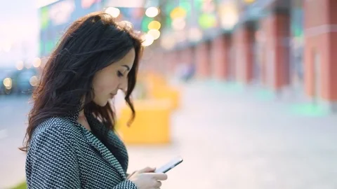 Circle span of the young beautiful business lady in strict gray jacket and black Stock Footage 75442231