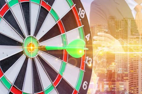 Circle target for shooting on dart board aiming, to succes comes after a lot  Stock Photos