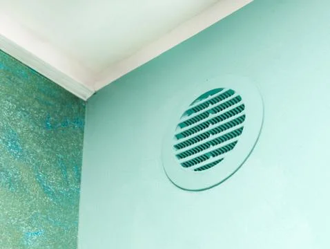 Circle vent window on green wall. Stock Photos