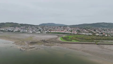 Circle view over River Convy and Conwy Castle from a drone, Convy, North Wales Stock-Footage 319964903