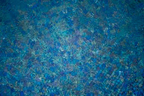 Circle water ripple wave surface background. Rain drop on swimming pool, blue Foto stock