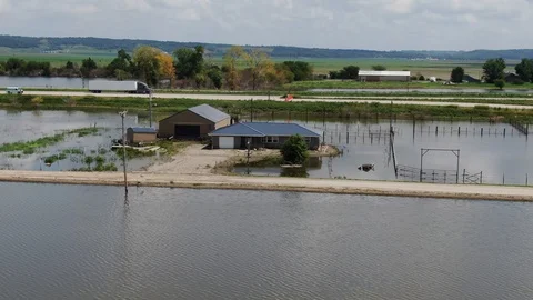 Circleing flooded farm Stock Footage 114749453