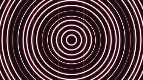 Circles of light create patterns on dark background in a Stock Footage 339499875