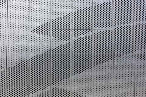 Circles on a metal surface pattern texture background Foto stock