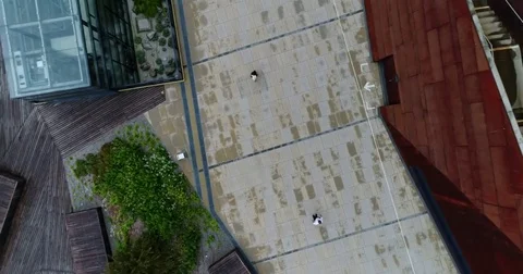 Circling above view from drone at the two strangers walking towards each other Stock Footage 82242536