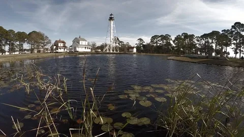 Circling around a land-based lighthouse in 50 percent slow motion. Stock Footage 90562703