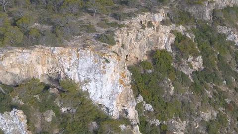 Circling around open Cave with drone Stock Footage 100262120