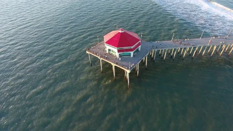 Circling around pier as waves roll in Stock Footage 157146068