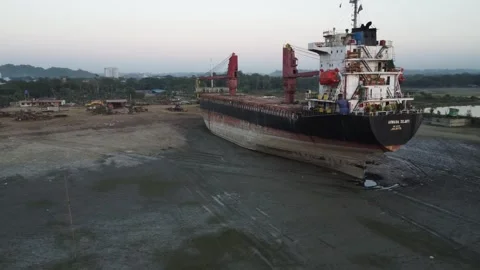 Circling a beached ship at a ship breaking yard at the coast of Bangladesh Stock Footage 327166241
