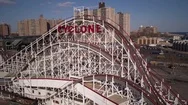 Circling Cyclone Roller Coaster In Coney Island Stock Footage