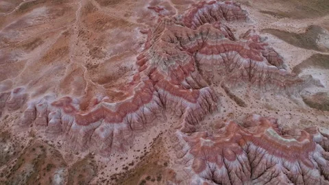 Circling over patterns of the Red Hills from aerial view in Wyoming Stock Footage 140379986