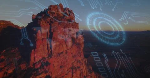 Circuit board and digital interface image over rocky mountain landscape 스톡 일러스트