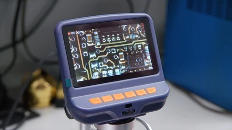 Circuit Board Being inspected with Advanced Microscopic Camera Enhanced Stock Footage 125913621