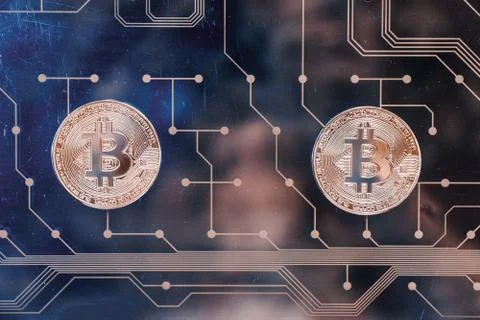 Circuit board with a bitcoin Fotos Stock