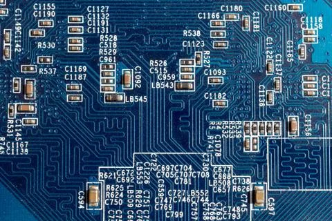 Circuit board close-up blue texture Stock Photos