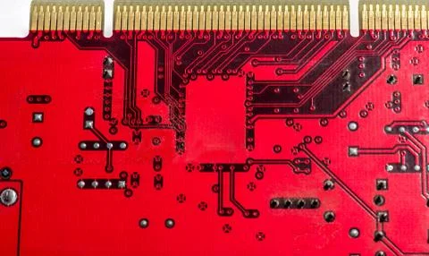 Circuit board close-up red texture Stock Photos