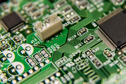 Circuit board computer background. Fragment of electronic digital board. Sele 스톡 사진