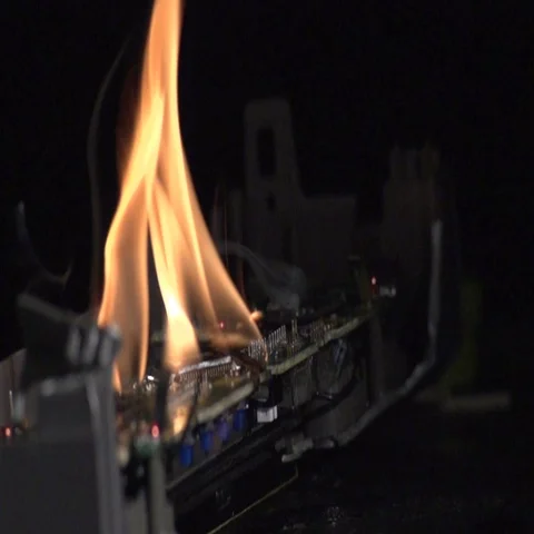 Circuit Board on Fire in Slow Motion Stock Footage 69695201