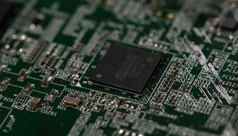 Circuit board with hardware electronics. Circuit board in macro background... Stock Photos
