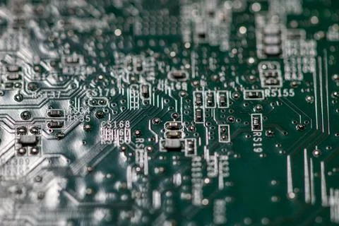 Circuit board with integrated hardware. Circuit board in electronic texture.. Stock Photos