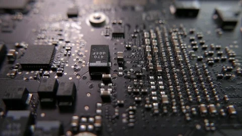 Circuit Board. Macro tracking over a circle board. Tracking straight. Stock-Footage 76388489