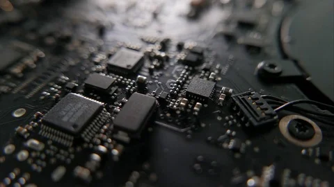 Circuit Board. Macro tracking over a circle board. Tracking in an angle Stock-Footage 76388514