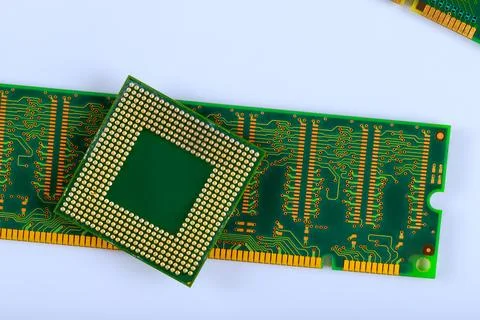 Circuit board microprocessor on awork surface during tech project Stock Photos