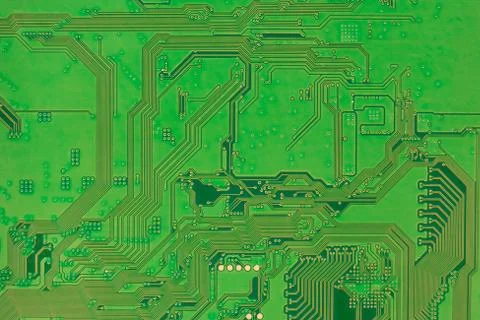 Circuit board, modern electronics backside green color background closeup Stock Photos