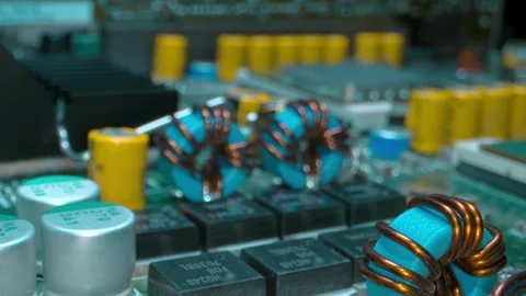 Circuit board with processor, transistors, diodes, coils and capacitors Stock Footage 313175686